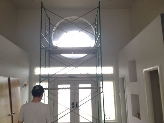 Painted living room with clean cut-in lines
